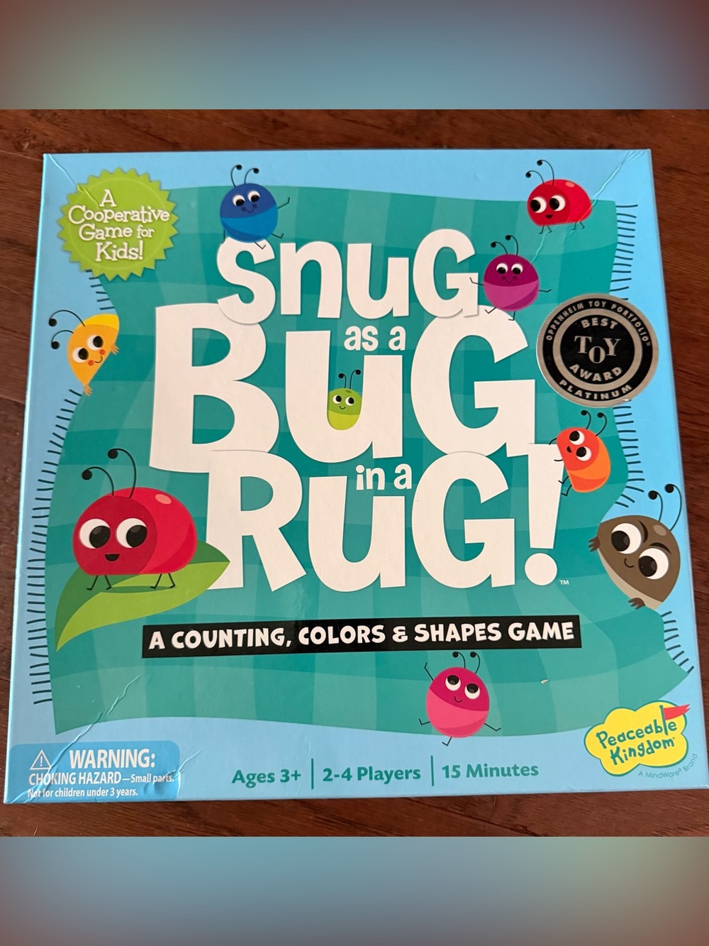 Snug as a Bug in a Rug! A counting, colors & shapes game
